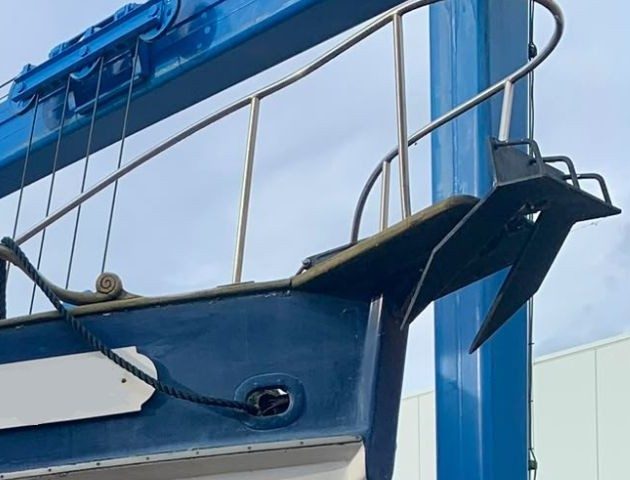Anchor and stainless railing on a boat bow