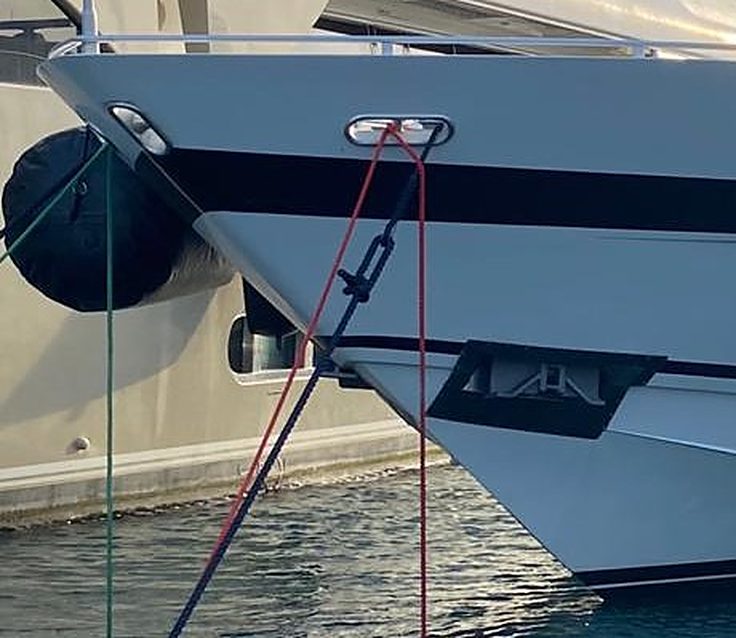 Yacht bow with fender and mooring lines